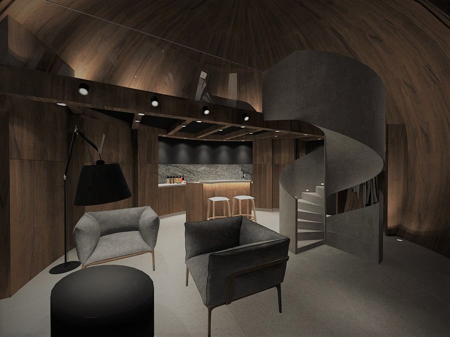 Wnętrze domu w Łodzi z drewnianymi ścianami, spiralnymi schodami, szarą sofą i otwartą kuchnią z barkiem.