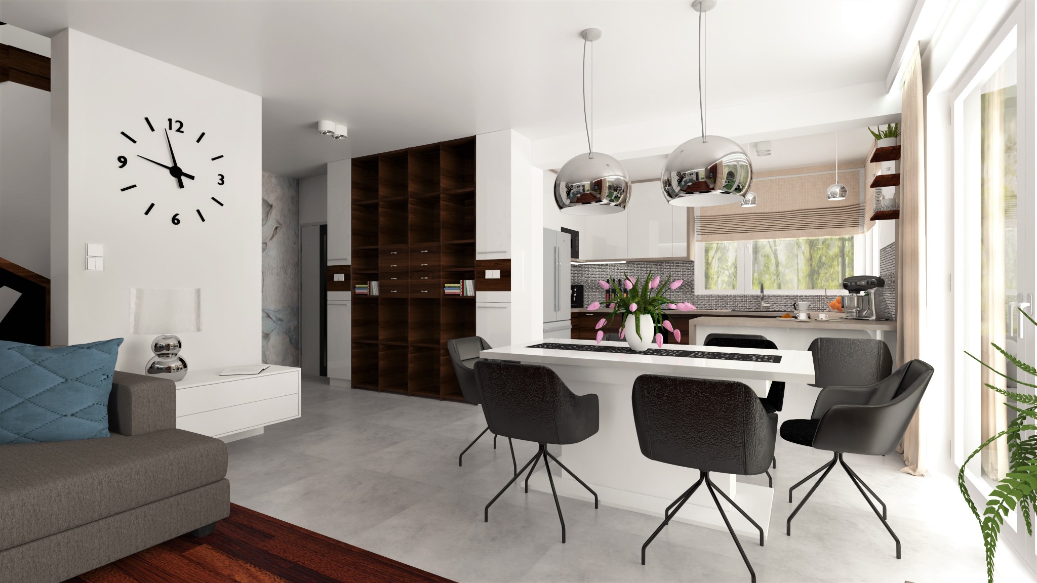 Wnętrze nowoczesnego mieszkania: biała kuchnia z wyspą, czarne krzesła barowe, drewniany regał na książki, zegar ścienny i szara sofa z niebieską poduszką.