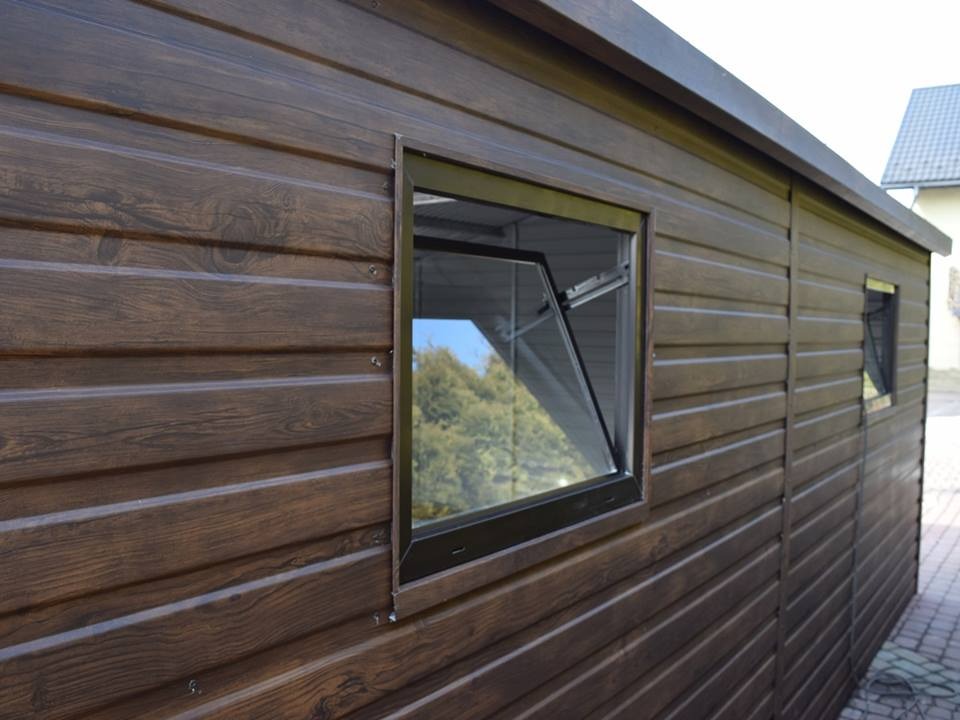 Garaże blaszane,bramy uchylne z napedem do pilotażu-okna PCV