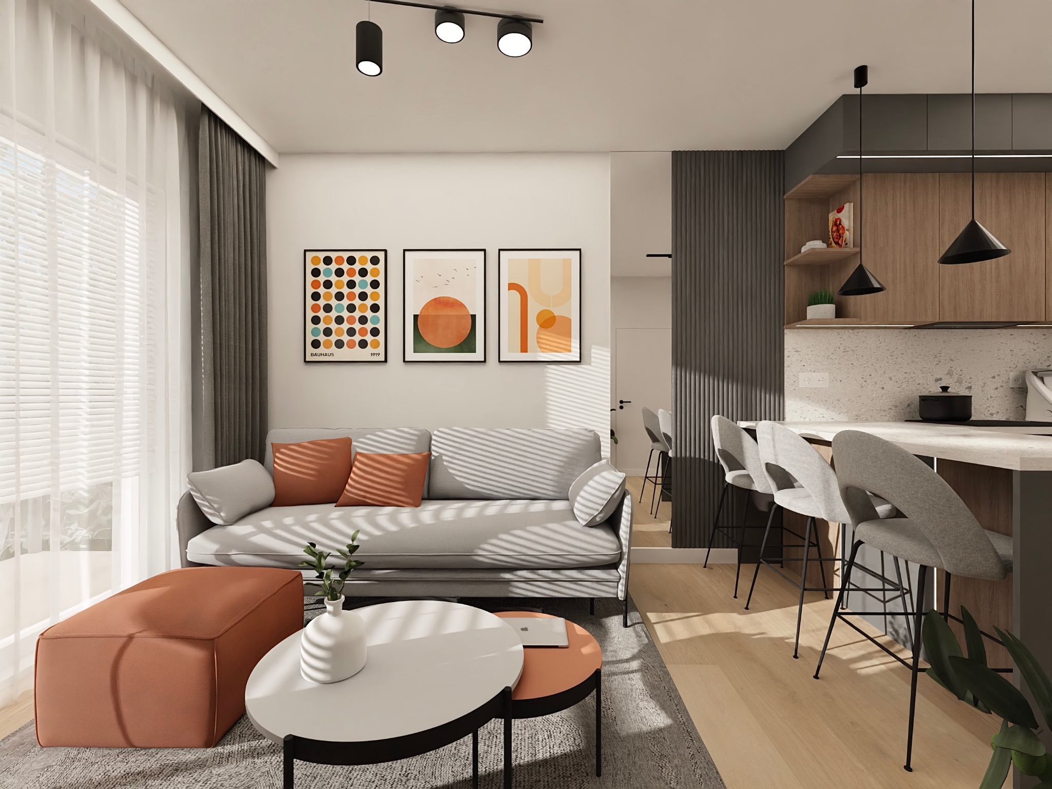 Nowoczesny salon z aneksem kuchennym w Mszczonowie. Szara sofa z pomarańczowymi poduszkami, stolik kawowy i pufa. Minimalistyczne oświetlenie i grafiki na ścianie.
