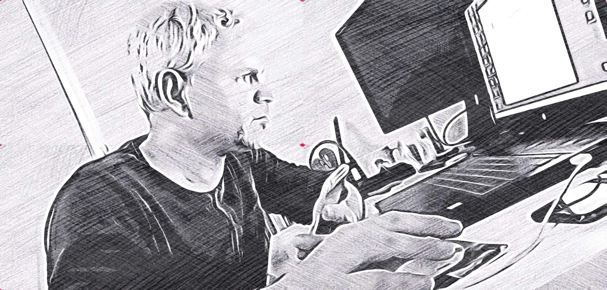 Stylizowany portret mężczyzny pracującego przy komputerze z tabletem graficznym; widok z profilu na twarz i dłonie w trakcie pracy.