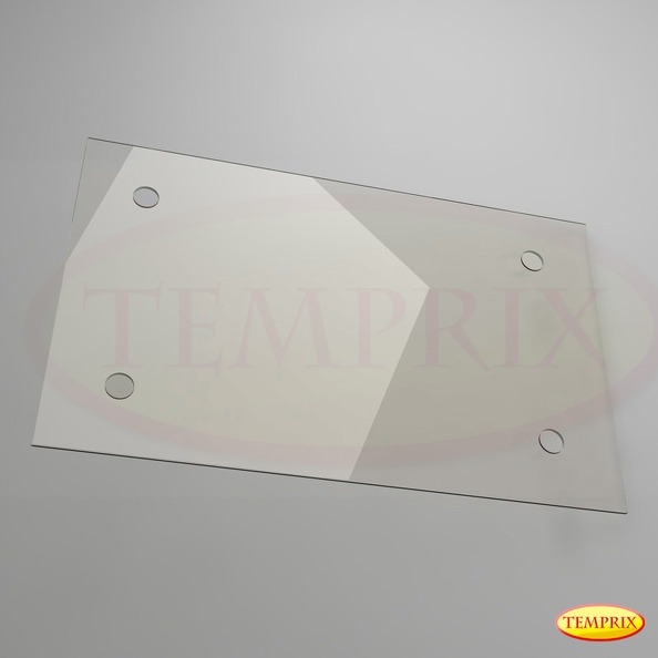 Prostokątna tafla szkła z czterema otworami, częściowo pokryta białą folią z geometrycznym wzorem, leżąca na szarym tle.