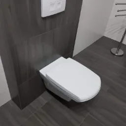 Podwieszana toaleta z przyciskiem spłukującym na ścianie wyłożonej ciemnymi, drewnopodobnymi płytkami, na podłodze identyczne płytki, fragment grzejnika drabinkowego w tle.