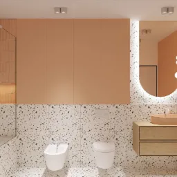 Wizualizacja łazienki w odcieniach brzoskwini z terazzo na ścianach i podłodze, owalne lustro z podświetleniem LED, umywalka nablatowa w kolorze brzoskwini, zabudowa meblowa z drewnianymi frontami,...