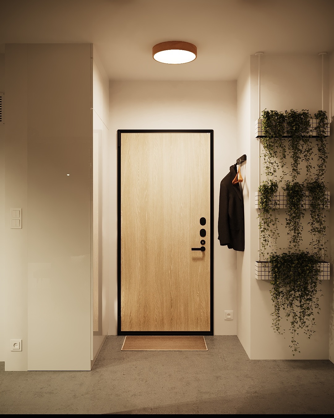 Nowoczesny przedpokój z drewnianymi drzwiami w czarnej ramie, minimalistycznymi roślinami pnącymi w metalowych doniczkach na ścianie i płaskim dywanikiem przed drzwiami.
