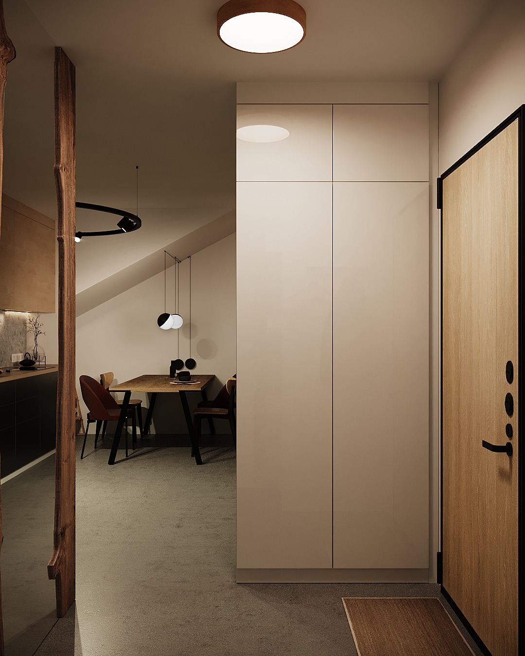 Wnętrze mieszkania z widokiem na jadalnię, minimalistyczna szafa w przedpokoju, drewniane drzwi wejściowe z czarnymi detalami, oświetlenie sufitowe i dekoracyjne lampy wiszące.