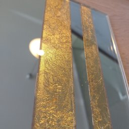 Lustro ręcznie zdobione złotem. 