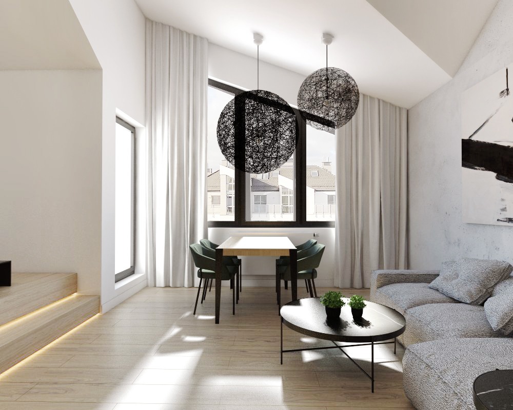 Jasne wnętrze z drewnianą podłogą, stołem jadalnym i szarą sofą, oświetlone dwoma kulistymi lampami wiszącymi i światłem wpadającym przez duże okno z białymi zasłonami.