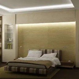 Nowoczesna sypialnia z podświetlaną ścianą za łóżkiem, wnęki dekoracyjne z kamieniem i oświetleniem punktowym, regał z książkami po lewej stronie.