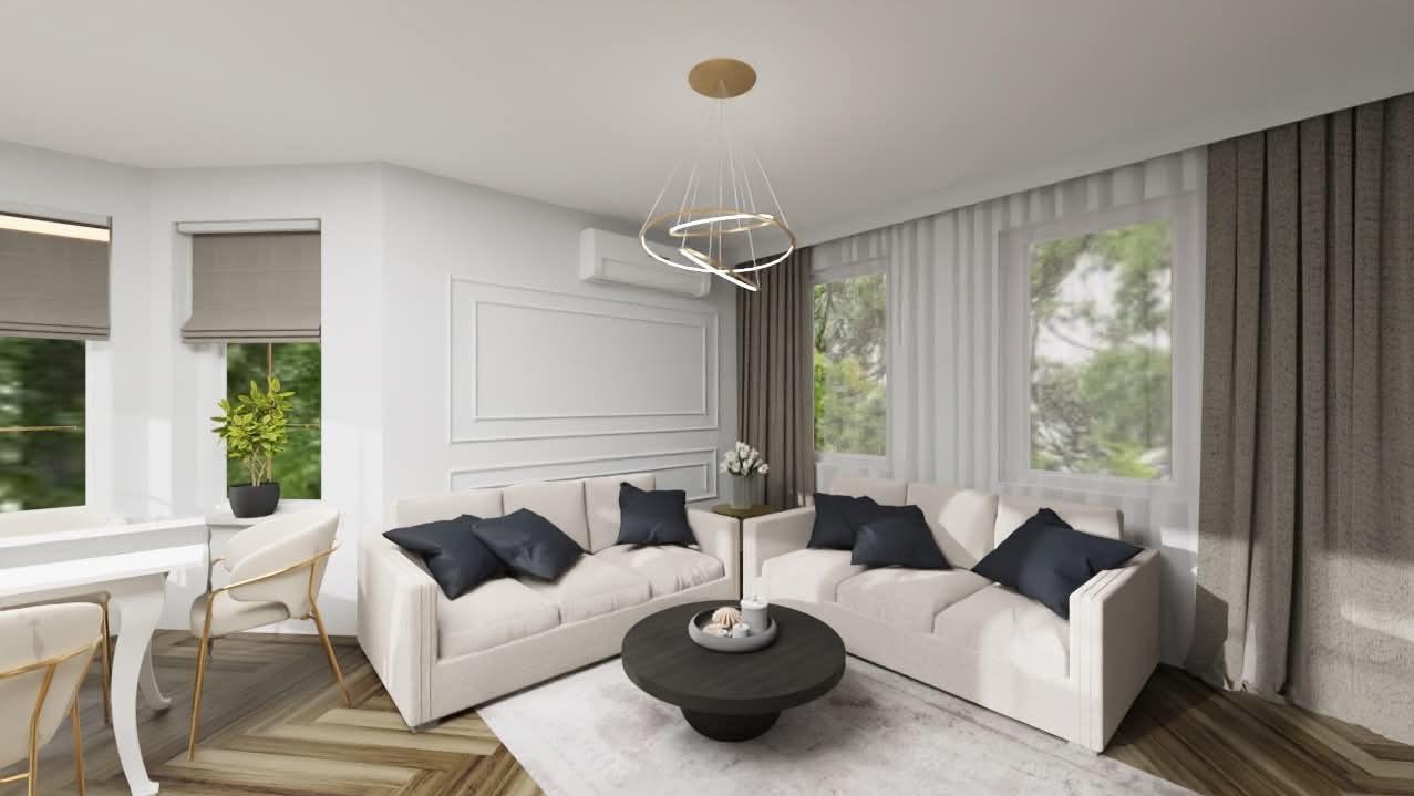 Elegancki salon z dwoma białymi sofami, ciemnymi poduszkami i okrągłym stolikiem kawowym. Parkiet w jodełkę, nowoczesna lampa i duże okna z widokiem na zieleń.