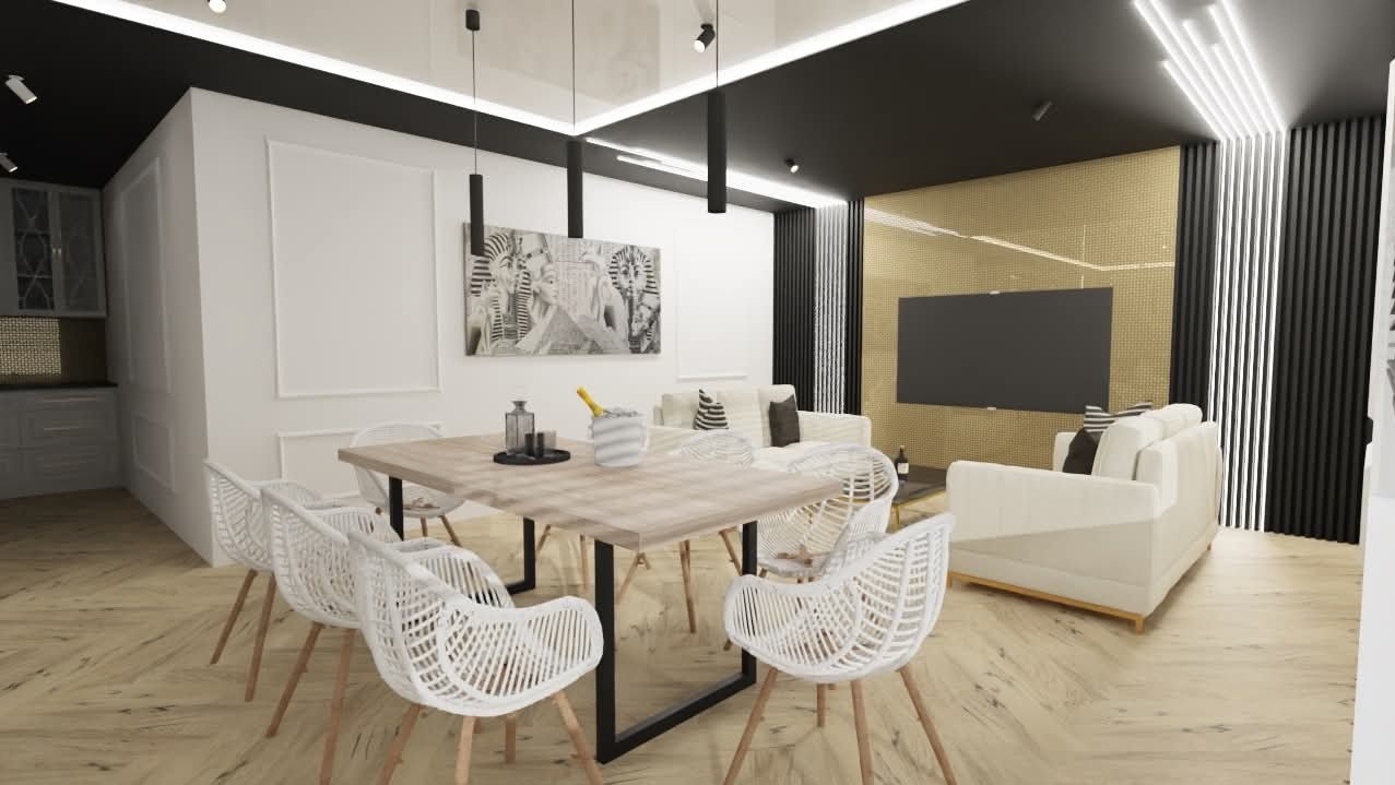 Nowoczesny salon z jadalnią: białe krzesła, drewniany stół z czarną podstawą, beżowa sofa, złota ściana z TV. Minimalistyczne lampy sufitowe.