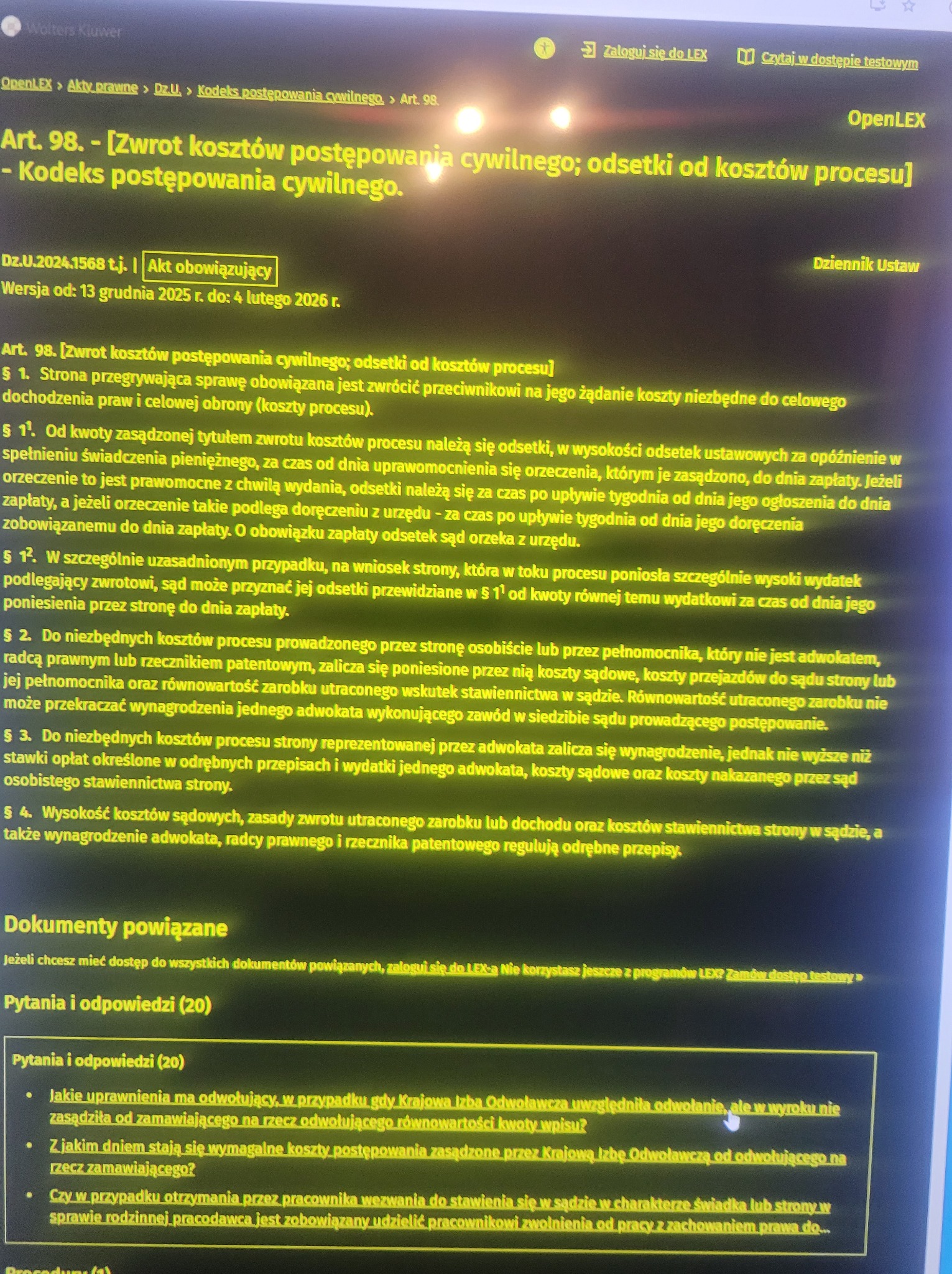 Ekran komputera z artykułem prawnym z serwisu OpenLEX, dotyczącym zwrotu kosztów postępowania cywilnego. Widoczne pytania i odpowiedzi dotyczące tematu.