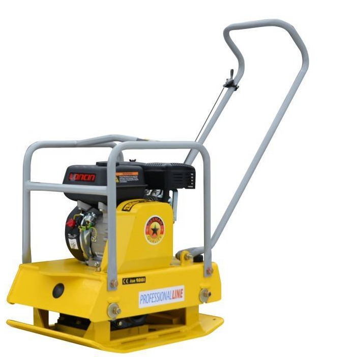 Żółta zagęszczarka gruntu z silnikiem spalinowym, widoczny napis 'PROFESSIONAL LINE' i logo z gwiazdą, na białym tle.