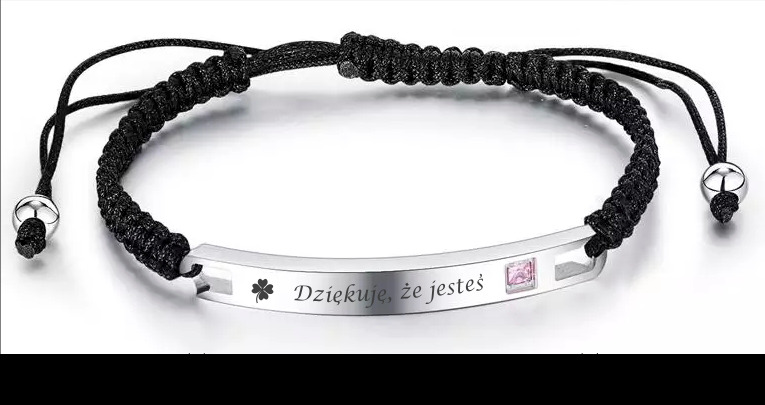Bransoletka z grawerowanym napisem.
