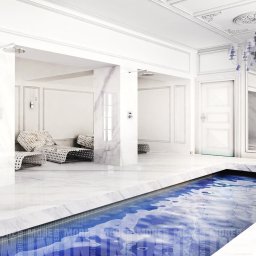 More IN Architekci - Luksusowy basen w jasnym wnętrzu łazienki w Sosnowcu, z marmurowymi wykończeniami i designerskim oświetleniem.