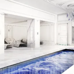 Luksusowy basen w jasnym wnętrzu łazienki w Sosnowcu, z marmurowymi wykończeniami i designerskim oświetleniem.