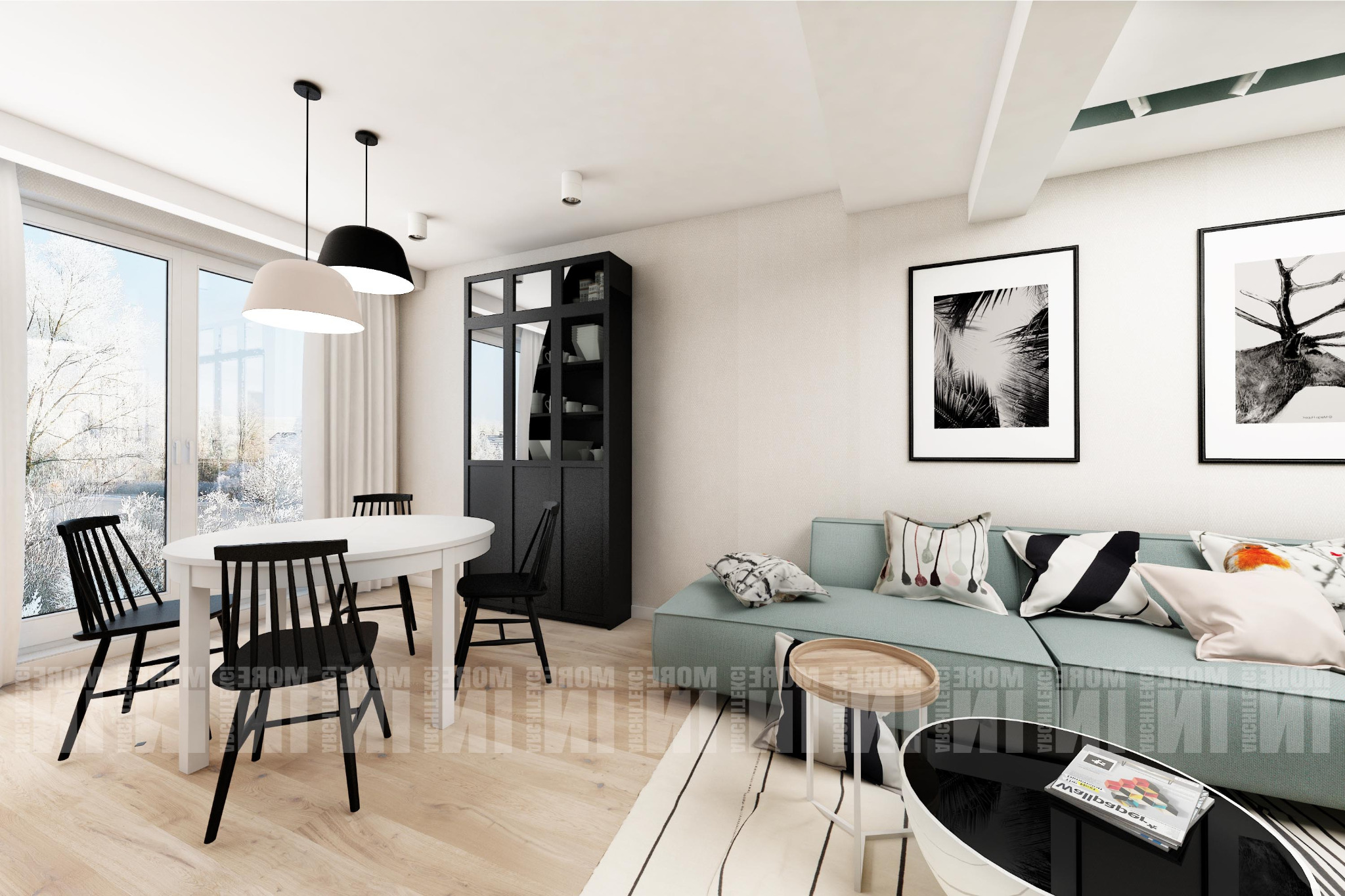 Wnętrze jasnego pokoju dziennego z okrągłym białym stołem i czarnymi krzesłami, turkusową sofą z poduszkami w geometryczne wzory, czarnym regałem z przeszkleniami i czarno-białymi obrazami na ścianie.