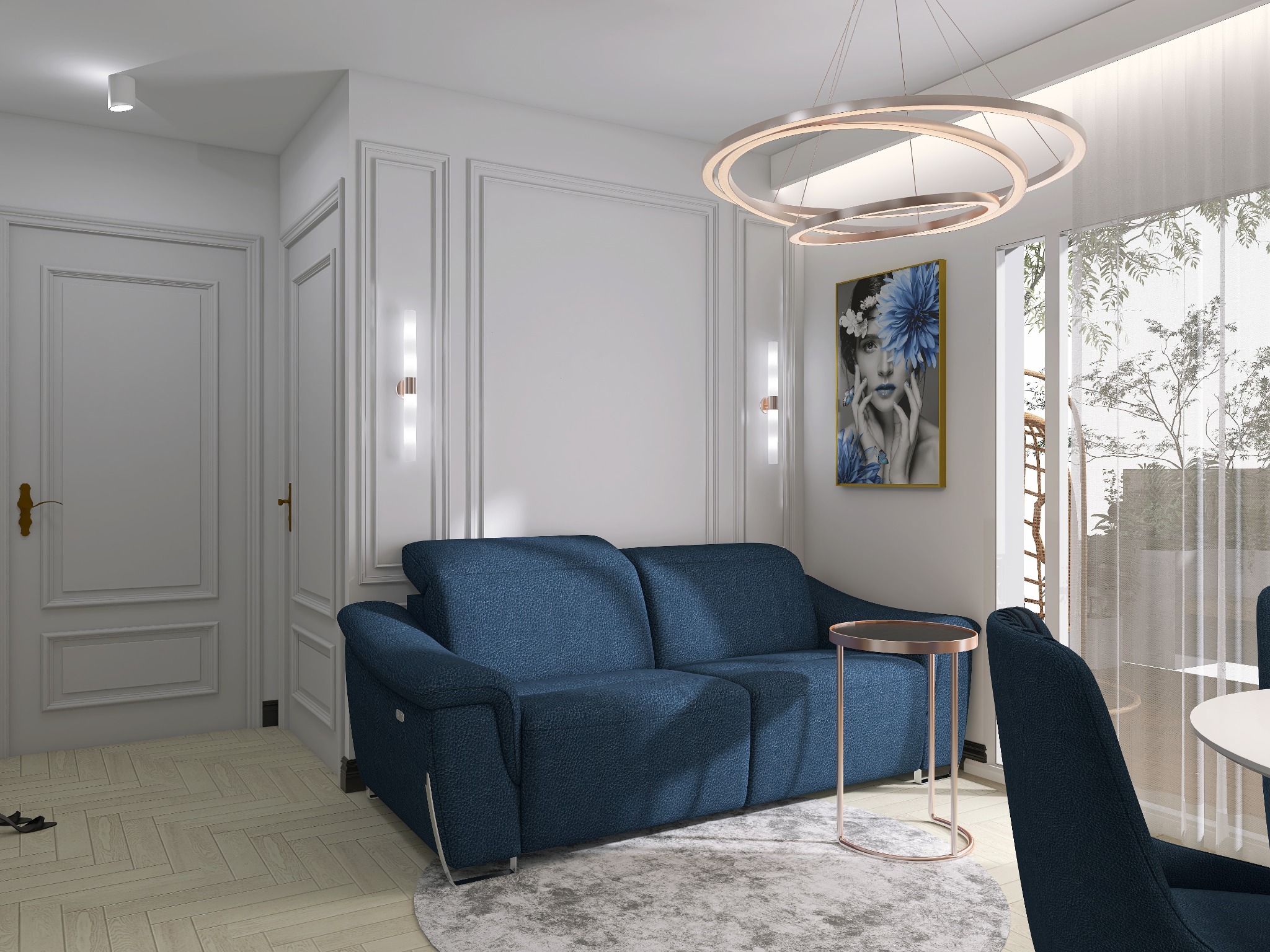 Salon w stylu nowoczesnym z granatową sofą, okrągłym stolikiem kawowym z metalową ramą, abstrakcyjnym obrazem i designerską lampą wiszącą.