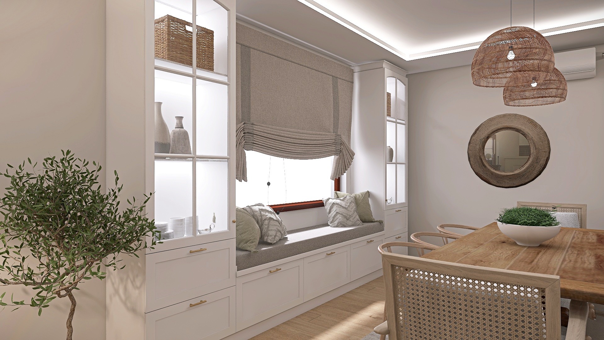 Jasne wnętrze jadalni z zabudowaną wnęką okienną z siedziskiem, drewnianym stołem z rattanowymi krzesłami i okrągłym lustrem, oświetlone trzema plecionymi lampami.