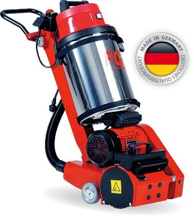 Czerwona, profesjonalna maszyna do czyszczenia powierzchni z metalowym zbiornikiem, oznaczona naklejką 'Made in Germany'.