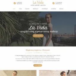 Strona internetowa salonu sukien ślubnych La Vida, prezentująca modelkę w sukni ślubnej na tle palm i fragmentu miasta.