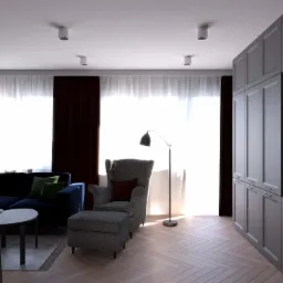 Wizualizacja salonu z ciemnoniebieską sofą, szarym fotelem z podnóżkiem, lampą podłogową i zabudową meblową w szarościach, oświetlonego światłem dziennym w Bydgoszczy.