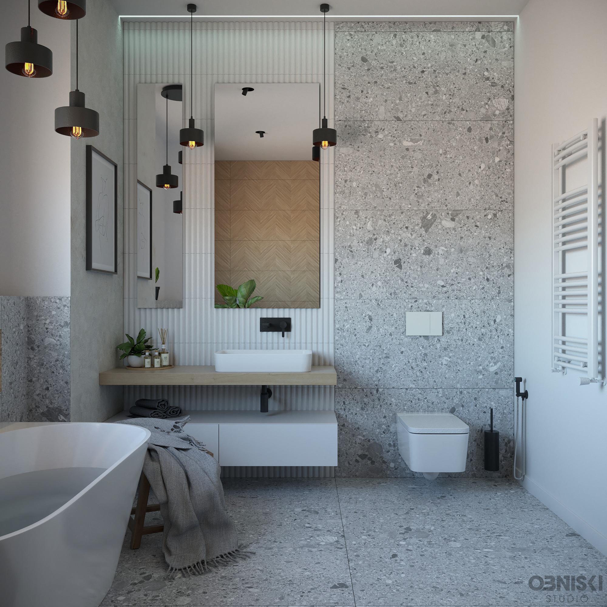 Nowoczesna łazienka z wanną wypełnioną wodą, szarą mozaiką na ścianach i podłodze, wiszącą toaletą, umywalką na drewnianym blacie, oświetleniem punktowym i dekoracyjnymi dodatkami.