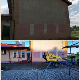 Usługi remontowo-budowlane Łukasz Lamparski - Elewacja budynku w trakcie odnawiania z widocznym podnośnikiem koszowym DINO 135T i fragmentami starej farby oraz nowej, jaśniejszej warstwy, otoczenie placu wyłożonego kostką brukową.