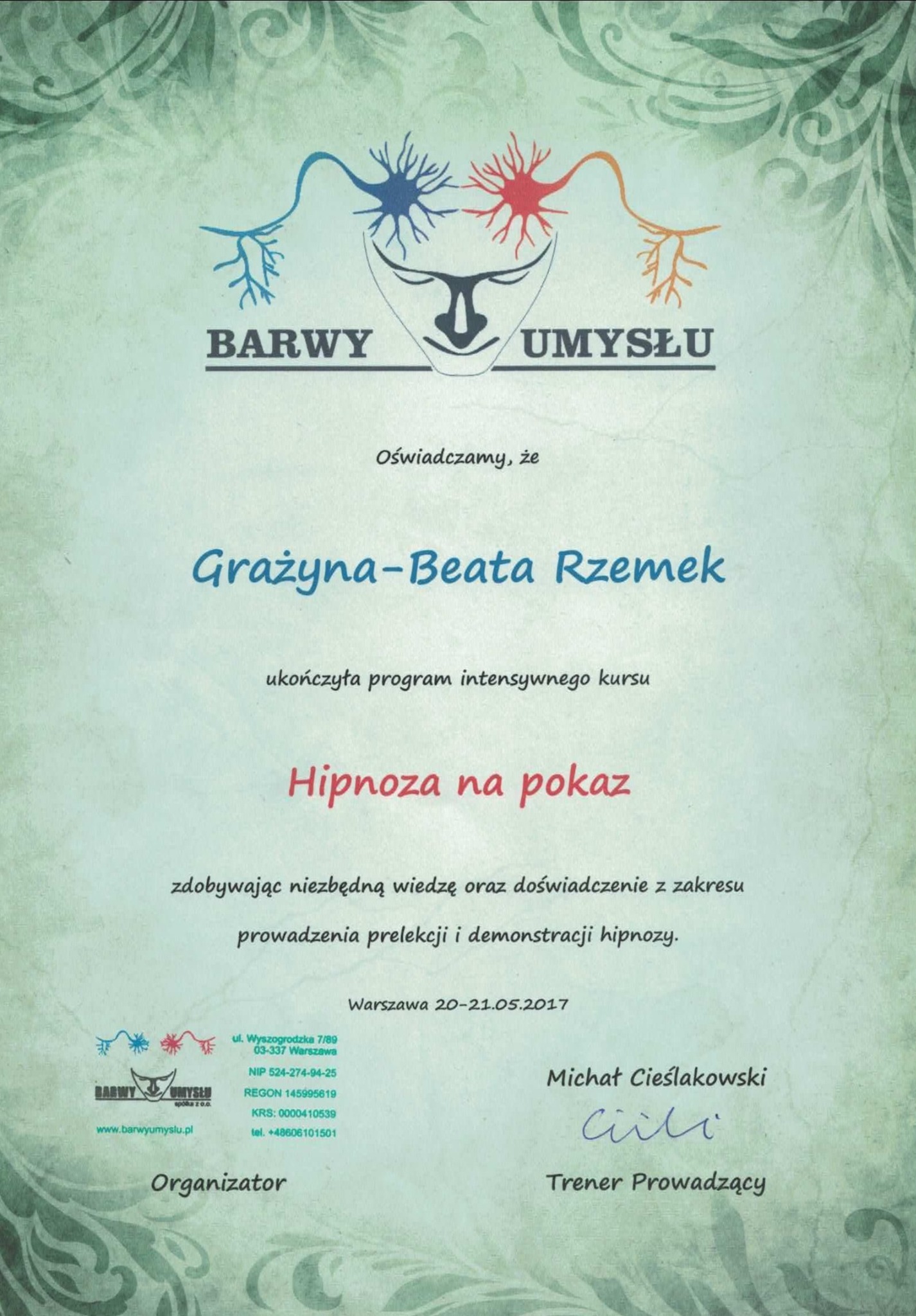 Certyfikat ukończenia kursu 'Hipnoza na pokaz' dla Grażyny-Beaty Rzemek, wydany przez 'Barwy Umysłu', z datą Warszawa 20-21.05.2017, podpisany przez trenera Michała Cieślakowskiego. Logo firmy...