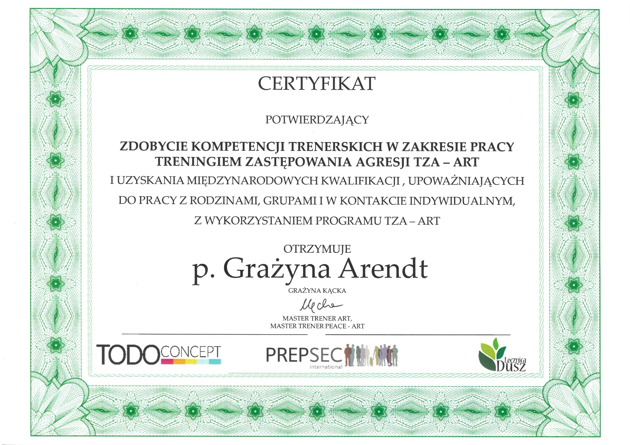 Certyfikat ukończenia szkolenia z zakresu pracy treningiem zastępowania agresji TZA-ART, wydany dla Grażyny Arendt, z logotypami Todo Concept, Prepsec International i Lecznica Dusz.