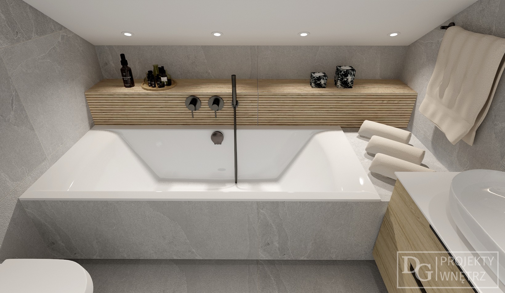 Nowoczesna łazienka z wanną, szarą płytką imitującą kamień i drewnianą półką. Minimalistyczne baterie, ręczniki i kosmetyki tworzą spójną całość.
