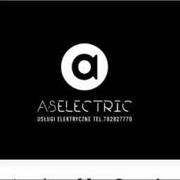 Logo firmy ASELECTRIC z białą literą 'a' w okręgu na czarnym tle, pod spodem nazwa firmy i informacja o usługach elektrycznych oraz numer telefonu.