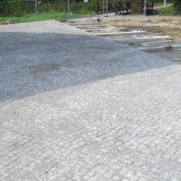 Rewitalizacja parku zdrojowego w Horyńcu Zdroju alejki szutrowe, kostka granitowa, płyty granitowe oraz obrzeża i krawężniki granitowe.