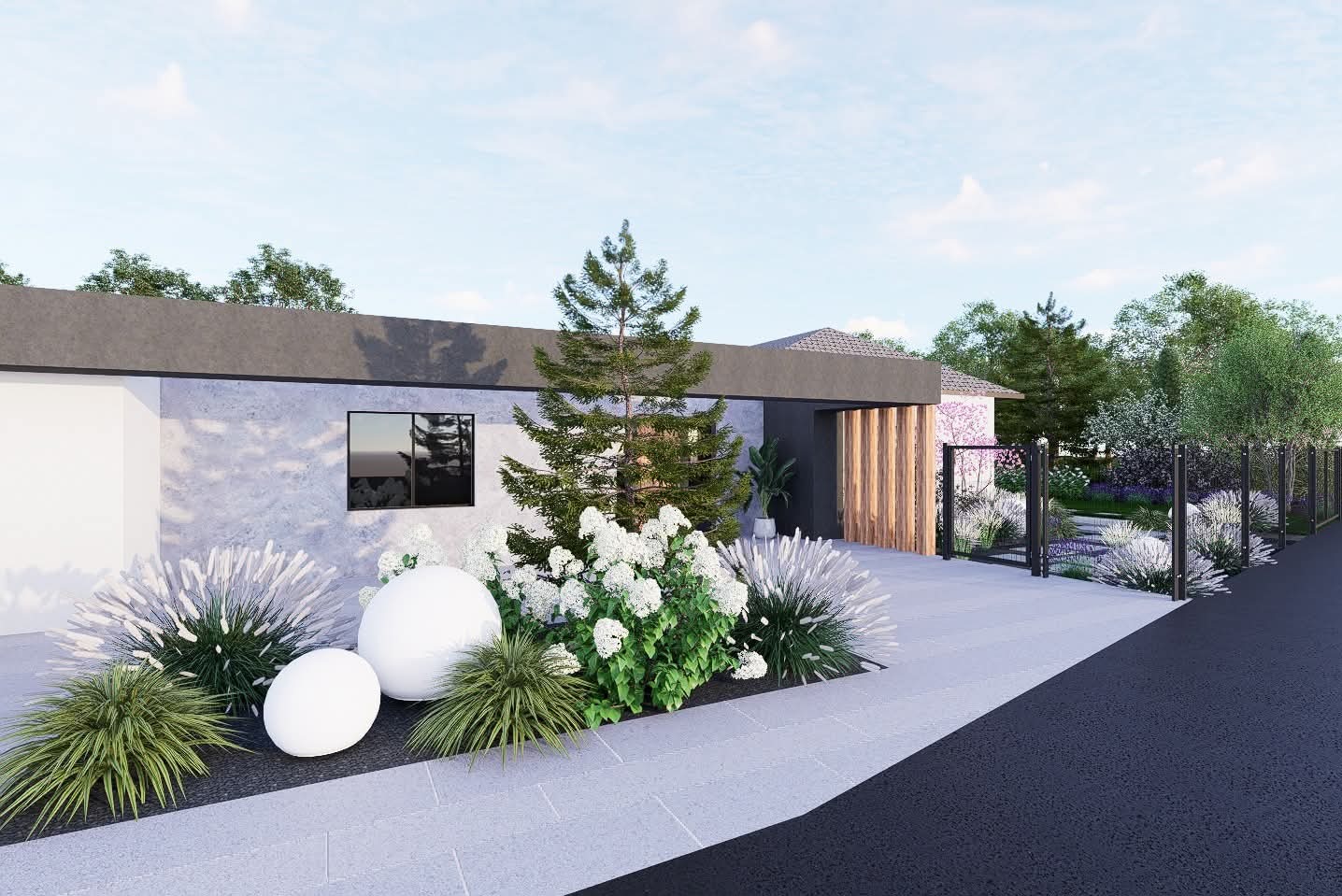 Nowoczesny ogród z białymi kulami dekoracyjnymi, strzyżonymi trawami i kwitnącymi krzewami na tle domu z szarą elewacją i drewnianymi elementami.