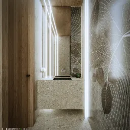 Nowoczesna łazienka z umywalką z lastryko, oświetleniem LED i tapetą w liście, widziana z perspektywy wejścia.