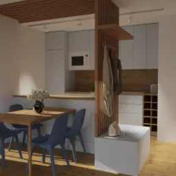 Wizualizacja kuchni z jadalnią, jasne szafki, drewniany blat, stół z niebieskimi krzesłami, dekoracyjna ścianka działowa z wieszakami i pufą, widok na zielony krajobraz za oknem.