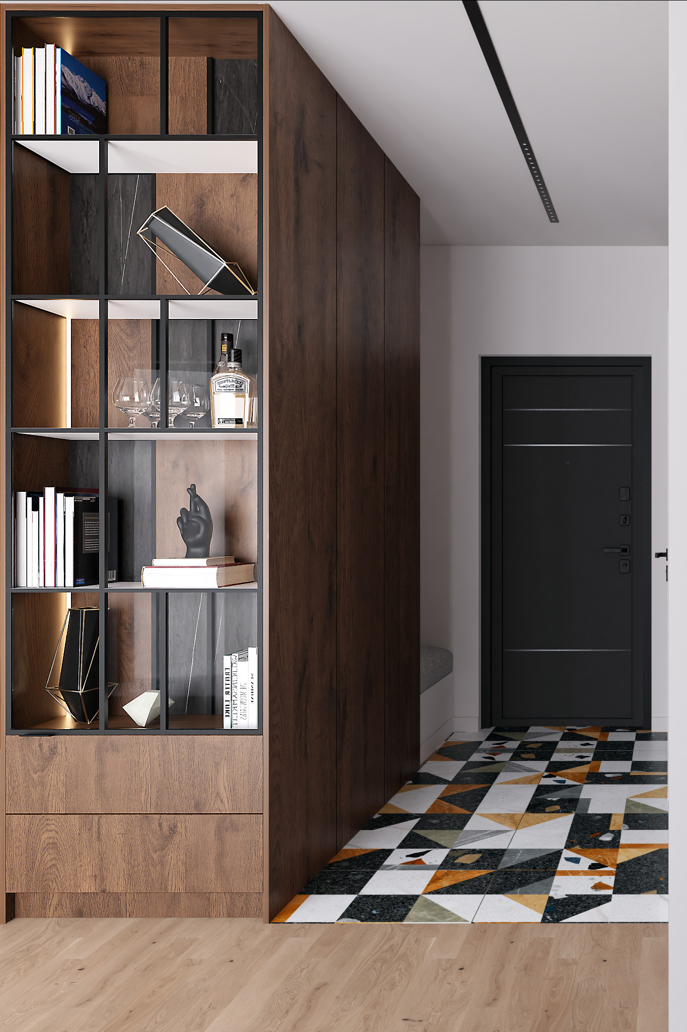 Nowoczesny przedpokój z drewnianą zabudową meblową, otwartym regałem z dekoracjami i książkami, oraz podłogą z geometrycznym wzorem płytek w odcieniach bieli, czerni i pomarańczy. Czarna...