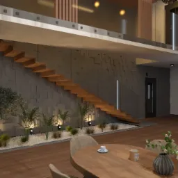 Dwupoziomowe wnętrze domu z drewnianymi schodami, kamienną ścianą z zielenią i oświetleniem punktowym, oraz okrągłym stołem jadalnym na pierwszym planie.