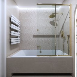 MSPROJEKT Michał Świerczek - Nowoczesna łazienka: wanna obudowana płytkami, szklany parawan z złotymi detalami, dekoracyjna ściana z motywem roślinnym i grzejnik drabinkowy.