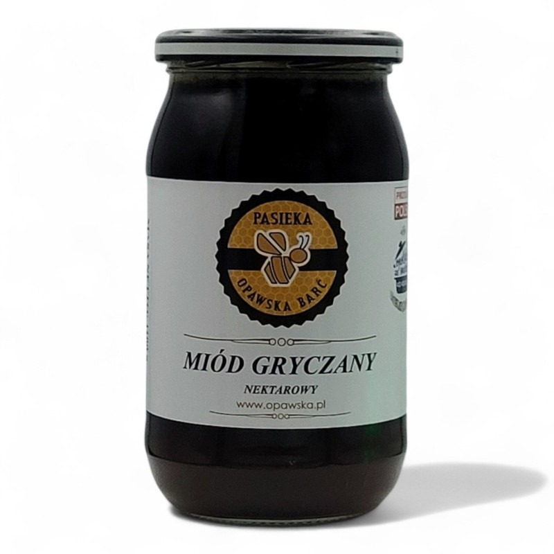 Słoik ciemnego miodu gryczanego z etykietą 'Pasieka Opawska Barć', na białym tle. Widoczny znak pszczoły i napis 'Miód Gryczany Nektarowy'.