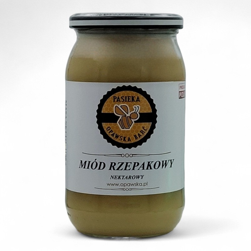 Słoik miodu rzepakowego z Pasieki Opawska Barć, nektarowy produkt z Głuchołaz. Widoczne logo pasieki z motywem pszczoły na etykiecie.