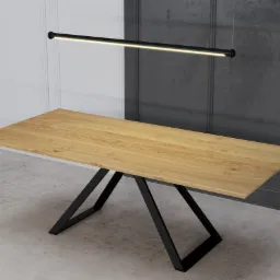 Blat drewniany o naturalnym odcieniu na czarnych, geometrycznych nogach, oświetlony ledową lampą w Siedlcach. Tło stanowią panele ścienne w dwóch odcieniach szarości.