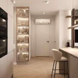 KAROLINA KINASZEWSKA Studio Projektowania Wnętrz - Wnętrze małej kuchni z jasnymi szafkami, wbudowanym piekarnikiem Miele, regałem z podświetleniem i dekoracjami, drewnianą podłogą w jodełkę oraz krzesłem barowym przy wyspie kuchennej.