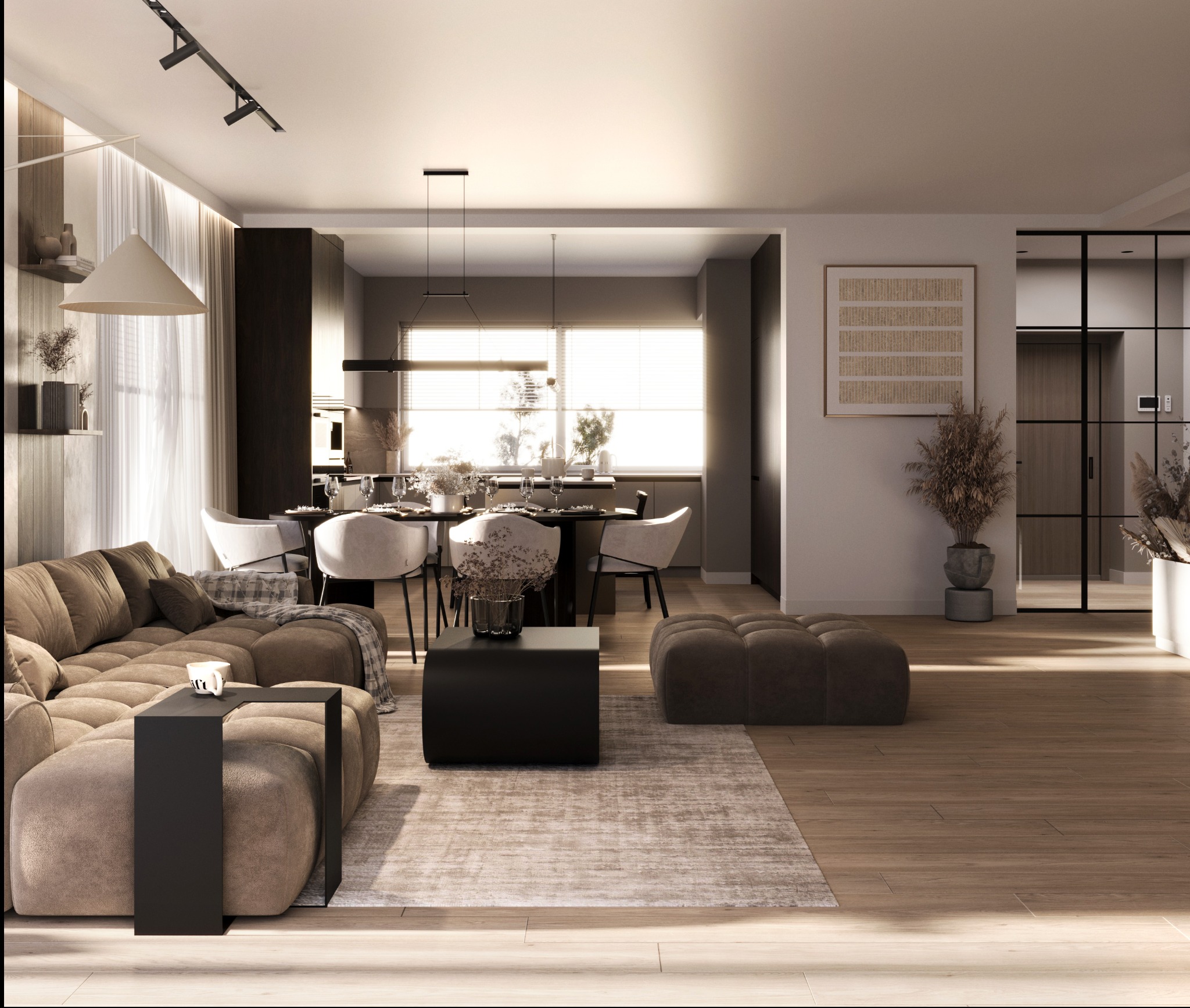 Przestronny salon w Krakowie z narożną sofą w odcieniach brązu, stolikiem kawowym, jadalnią z okrągłym stołem i krzesłami oraz otwartą kuchnią w tle, oświetlony naturalnym światłem.