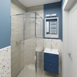 Wizualizacja łazienki z kabiną prysznicową ze szklaną ścianką, niebieską szafką pod umywalką i grzejnikiem drabinkowym w białej ramie lustra na niebieskiej ścianie.