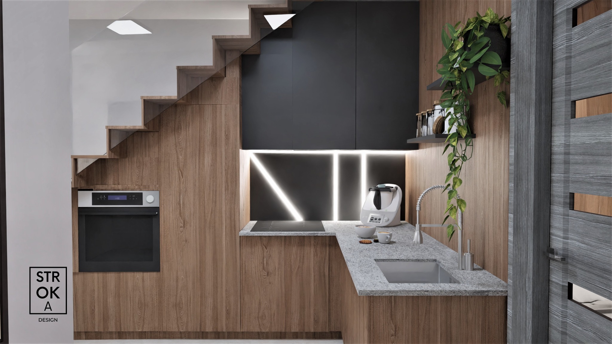 Kompaktowa kuchnia z drewnianymi frontami szafek, czarnymi elementami i podświetleniem LED, zintegrowana ze schodami, z blatem z szarego kamienia i rośliną pnącą na półce.