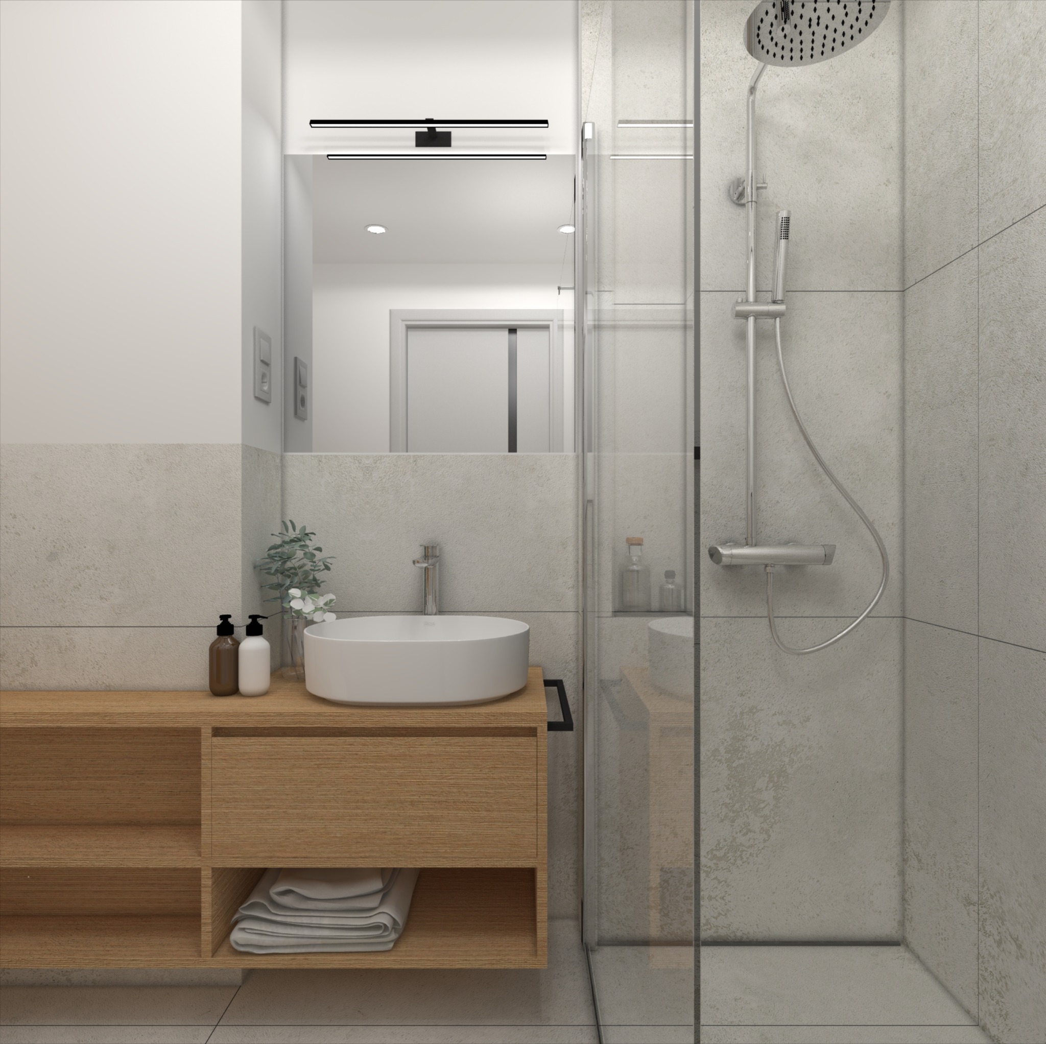 Nowoczesna łazienka z drewnianą szafką pod umywalką, okrągłą białą umywalką, szklaną kabiną prysznicową i szarą płytką imitującą beton.