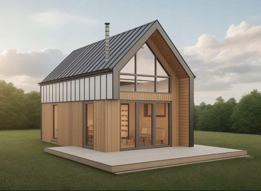 Nowoczesny dom szkieletowy z dużymi oknami i drewnianą elewacją, otoczony zielonym trawnikiem. Dach dwuspadowy z blachy w kolorze grafitowym.