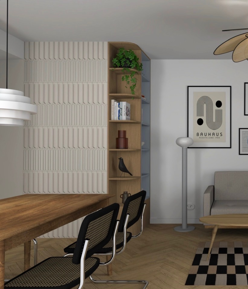 Nowoczesna jadalnia z drewnianym stołem, krzesłami z plecionką i dekoracyjną ścianą z pionowymi panelami. Na ścianie plakat Bauhaus i regał z książkami.