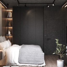 Sypialnia w ciemnych odcieniach z płytami z betonu arcitektonicznego